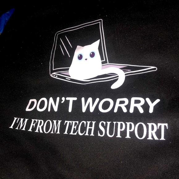 This is a Large womans sweatshirt from Shein. Black and white with blue pupils. - Picture 2 of 4